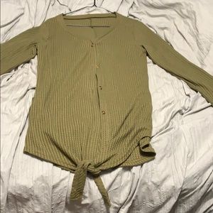 Olive green long sleeve shirt with tie at bottom